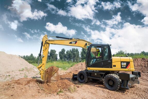 Аренда колесного экскаватора Caterpillar M315D2 с грейфером