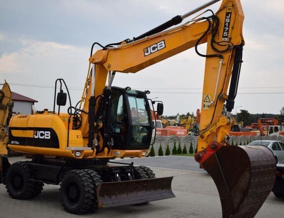 Аренда колесного экскаватора JCB JS 175W с грейфером