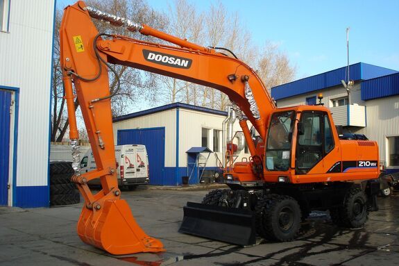 Аренда колесного экскаватора DOOSAN S210W-V с грейфером